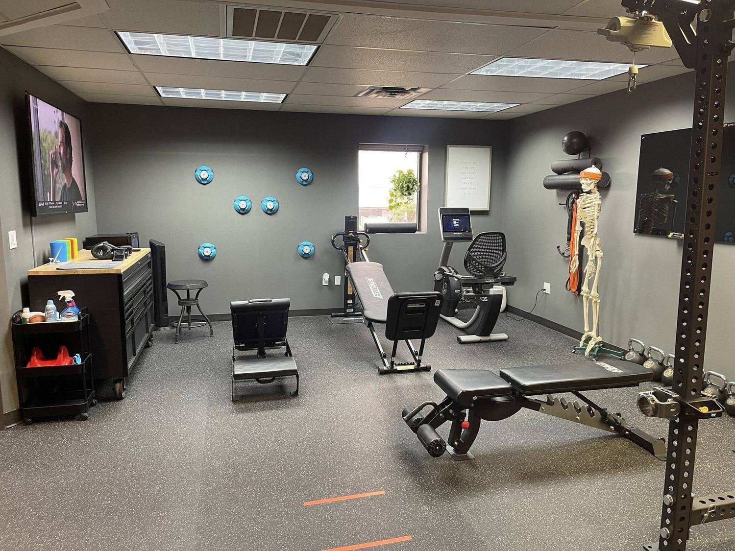 Strength equipment inside the Forever Forward Physical Therapy clinic in South Austin